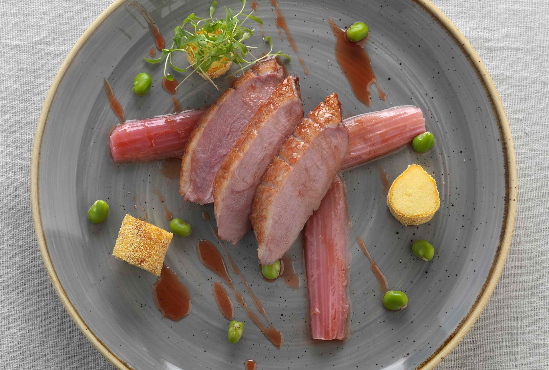 Bittersweet glazed duck breast, crispy polenta, rhubarb