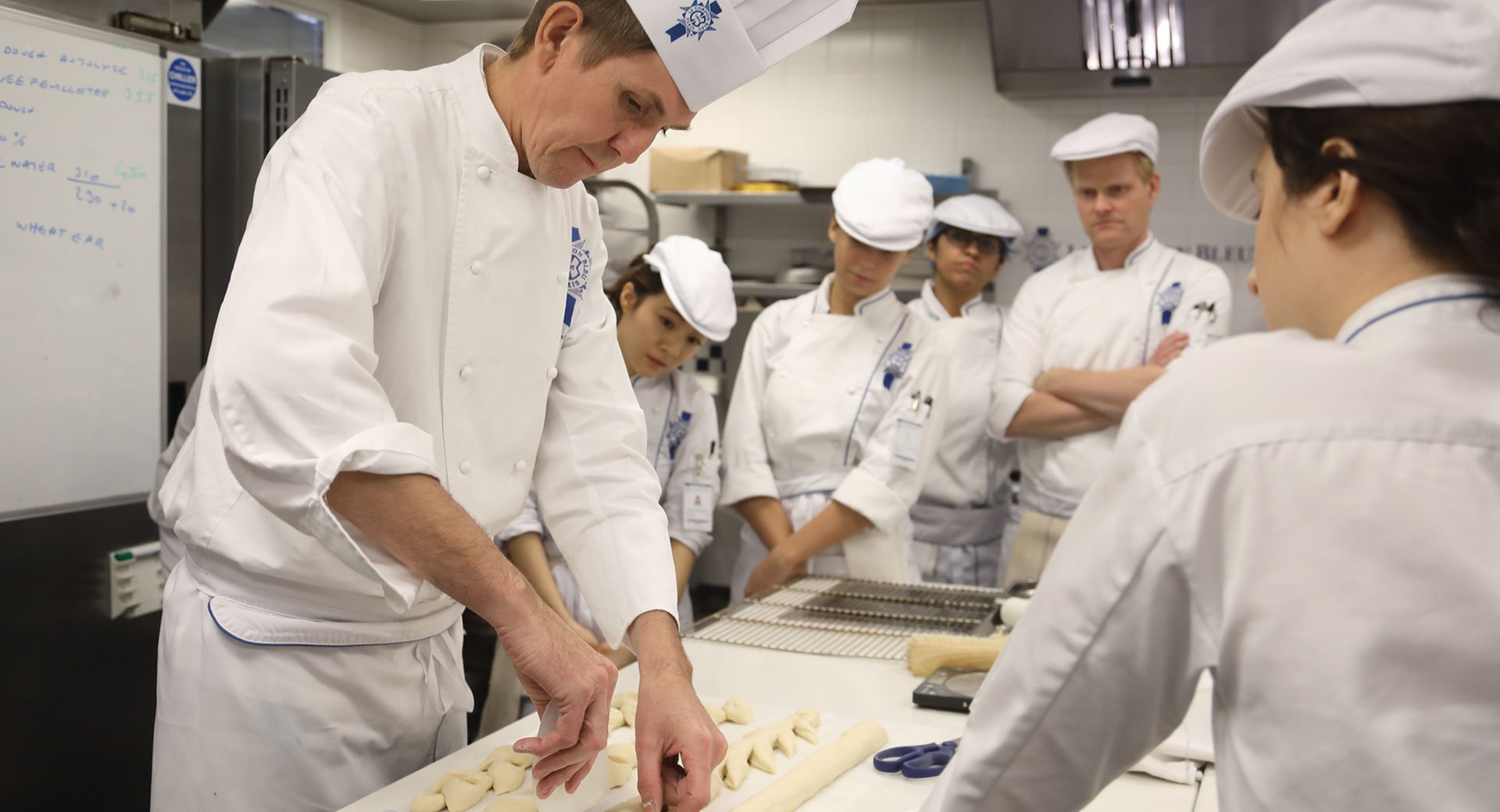 chef dominique moudart with boulangerie students at le cordon bleu london