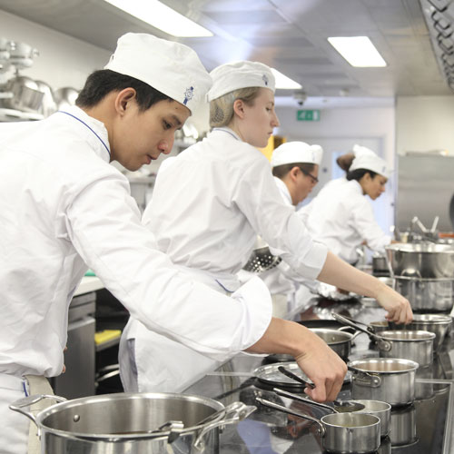 Le Cordon Bleu students in the kitchen