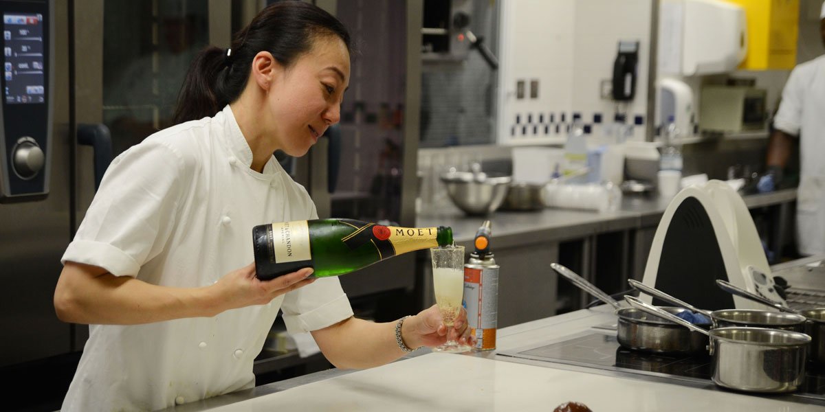 Hideko Kawa pouring champagne in sugar glass